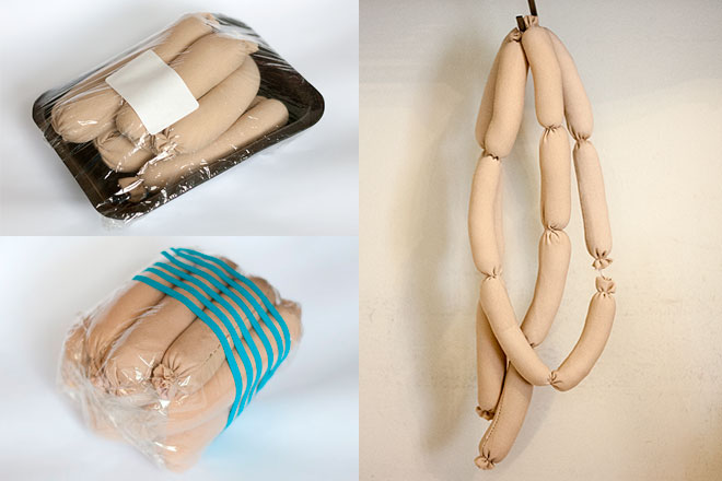 Sausages made from shapewear, hanging up as a string and in packets. 